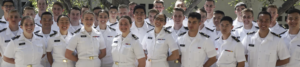 Midshipmen gathered together in white uniform