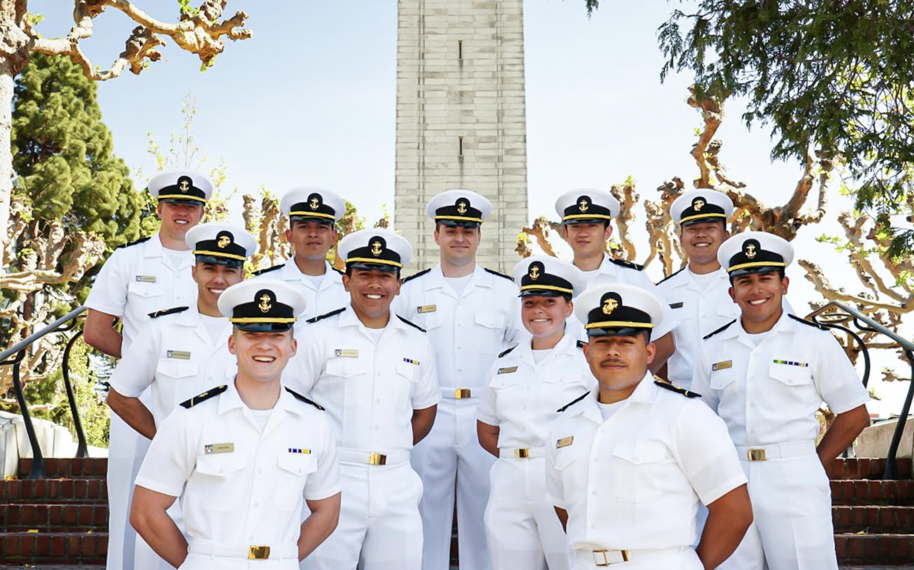 Large group of midshipmen dressed in white uniform