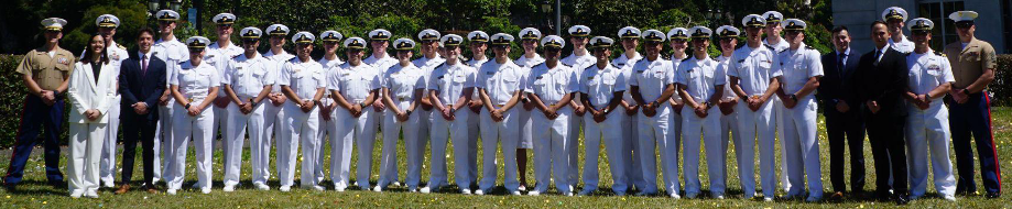 Midshipmen gathered together in military dress uniforms