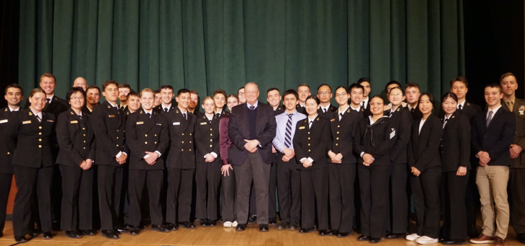 Group photo of midshipmen and senior officers with the 2025 Nimitz Lecturer, General John R. Allan